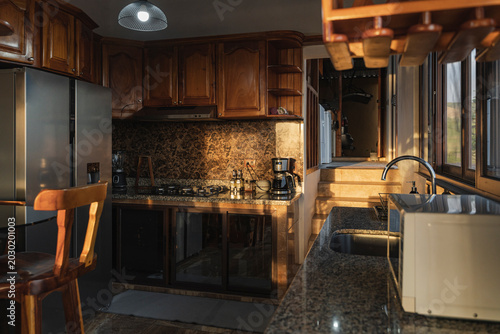 Rustic wooden kitchen interior with warm morning light