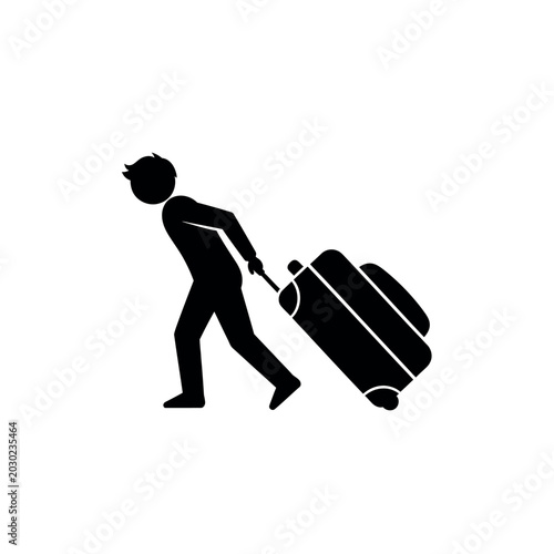 Silhouette of a person pulling a suitcase.