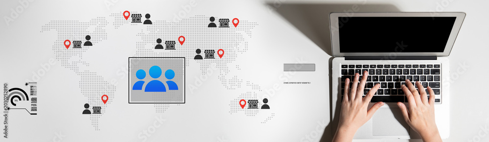Fototapeta premium A hands-on laptop photo featuring a world map with people icons and location markers, highlighting themes of global communication and digital connectivity in modern workspaces. Cyphers