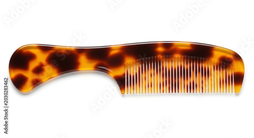 Classic tortoiseshell patterned hair comb with an ergonomic handle isolated on a seamless bright white background for commercial use. 