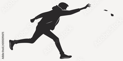 Bild auf Leinwand Silhouette of a man running and reaching towards falling leaves against a plain