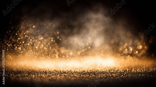 Brilliant golden sparkles rise from a dark, glittering surface amidst rising smoke or dust