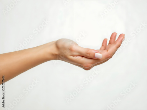 right hands of the women with white background