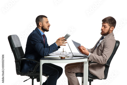 Happy businessmen with docu...