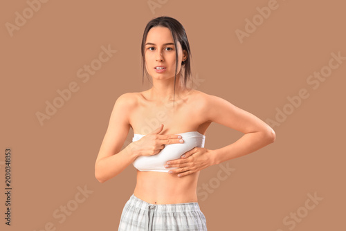 Young woman checking her br...