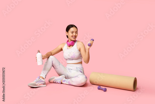 Young woman in sportswear, ...