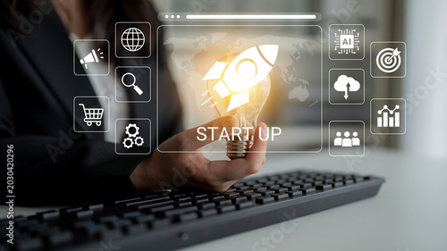 Photos Visual representation of startup concepts featuring a light bulb and rocket