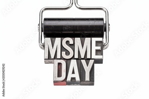 MSME Day celebration with a metal stamp on a clean white background