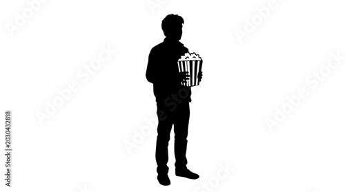 Silhouette of a person holding a bucket of popcorn