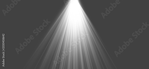 Tableau sur toile Bright monochrome projector ray expanding down from top center on dark backdrop