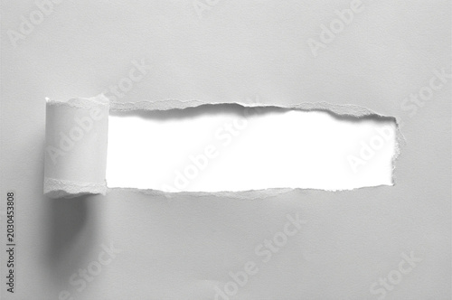 Konstfotografi Paper roll reveal with paper strip with tear edges cutout