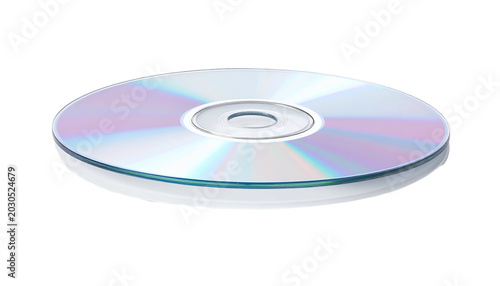 Stack of blank CDs reflects light with iridescent shine on black back