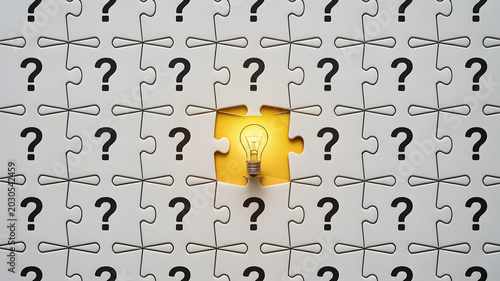 A puzzle piece with a lightbulb stands out from a sea of question marks