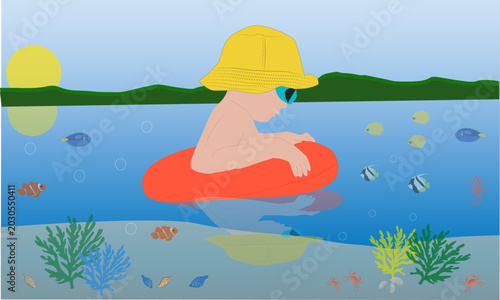 Child floating in tropical water