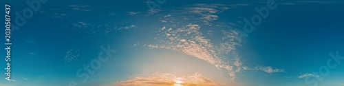 Bild auf Leinwand Panorama sky sunset with soft altocumulus clouds over a glowing horizon at golde