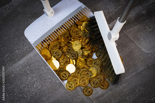 The piles of gold bars and coins were swept into the trash.