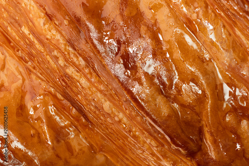 Foto Ultra sharp croissant texture macro baked pastry crust background