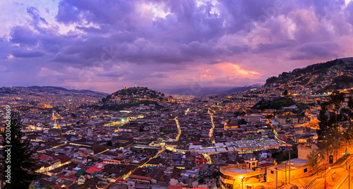 Ecuador, Quito, cityscape with El Panecillo at sunset