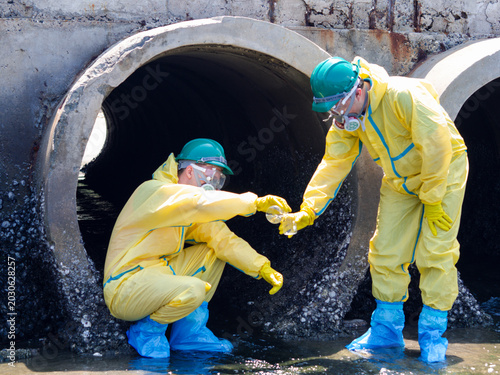 фотографія Water quality monitoring: Analyzing hazardous wastewater samples collected from contaminated coastal waters, while monitoring ecological damage and industrial contamination sources