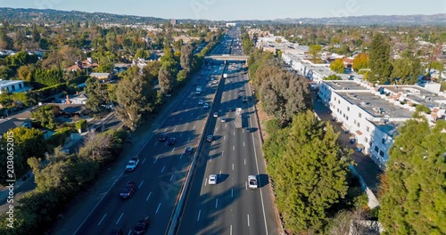 Highway 101 and Apartments Time-lapse Aerial View