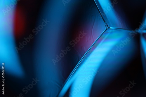 Abstract Close-Up of Soap Bubbles with Blue Futuristic Lighting. Macro glossy background 