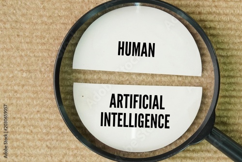 Canvas-taulu A magnifying glass with the words human and artificial intelligence