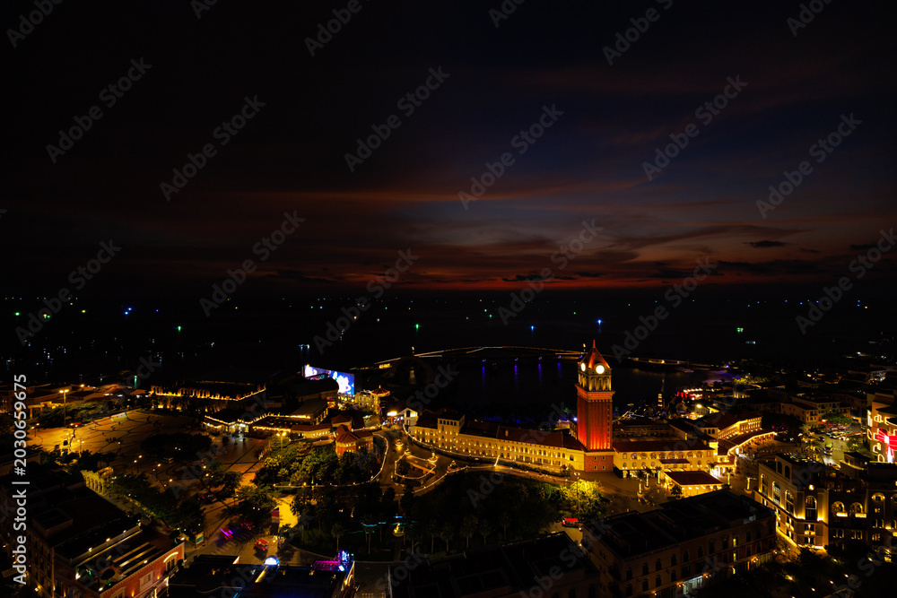 Fototapeta premium Phu Quoc, Vietnam – March 03, 2026: Sunset Town Rooftop View at Night, Phu Quoc