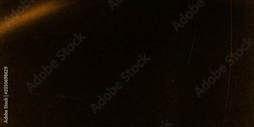 Photos Abstract dark grunge background featuring a weathered black and brown wood textu