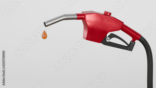 Four red gas pump nozzles isolated background