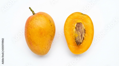 Mango Marian plum fruit whole and half on white
