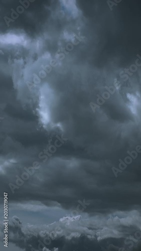 Ominous dark grey storm clouds filling the horizon before rain