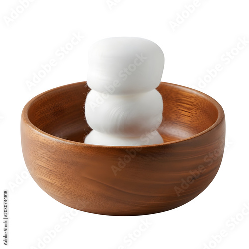 White mushroom in wooden bowl