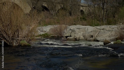 River waters rushing over rocks