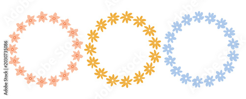A set of floral wreaths with cute pink, yellow and blue flowers. Botanical circle frames isolated on white background. Perfect for wedding invitation, logo, greeting card, and decorative design.