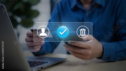 Mobile payment and secure online banking transaction concept. man using smartphone and credit card, verifying digital transfer through mobile app for fast, safe, and seamless financial service