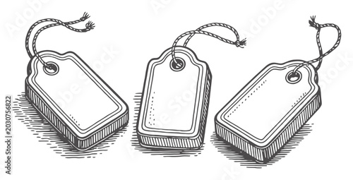 Photos Three blank vintage style tags with string, ready for customization