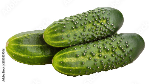 Schilderij op canvas Three bumpy green cucumbers with yellow stripes