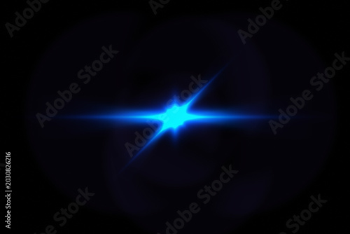Glowing blue lens flare on black background