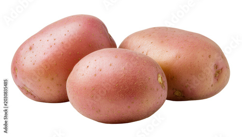 Foto Three pink-skinned potatoes with small brown eyes