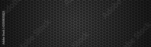 Bild auf Leinwand Dark honeycomb mesh background with hexagonal carbon pattern.