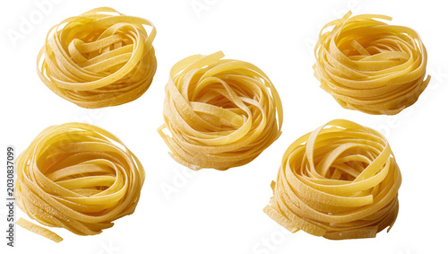 Photos Five nests of uncooked fettuccine pasta