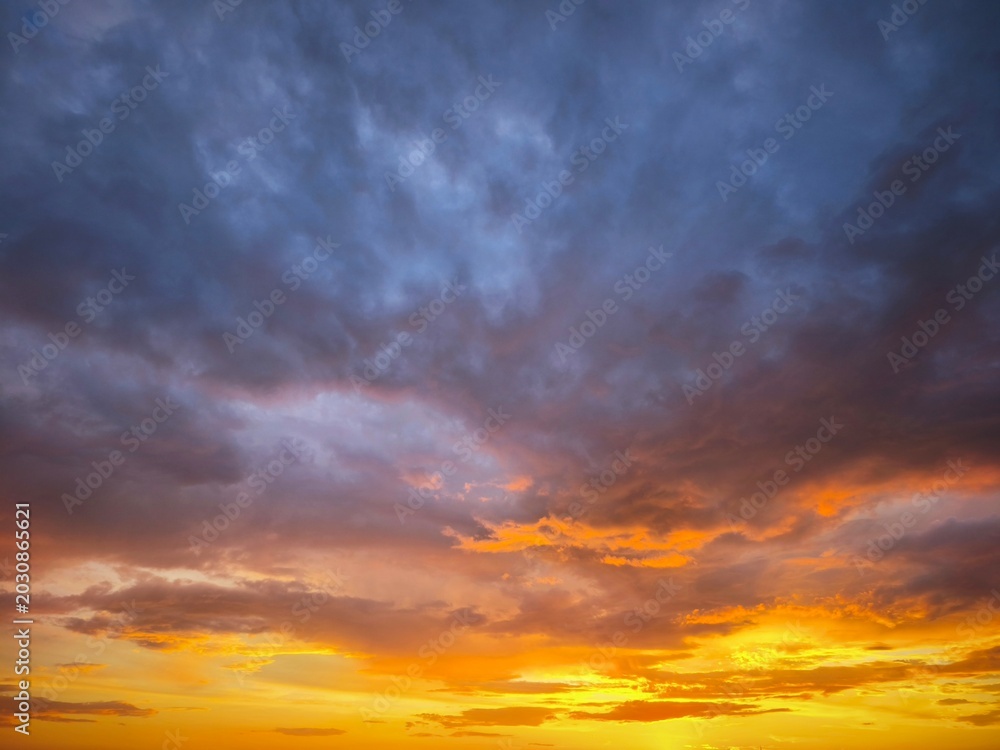 Fototapeta premium Colorful Sunset Sky Background with Blue, Yellow and Red Tints