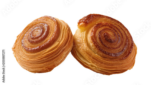 Canvas Print Two golden brown swirled danish pastries with flaky layers