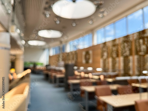 Blurred interior of a modern library or study space background
