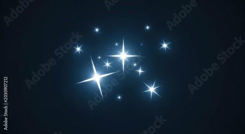 Sparkling white starbursts shine brightly on a dark blue background creating a magical atmosphere with glowing effects