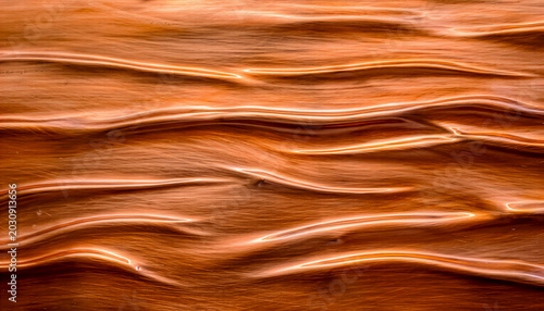 Metallic copper liquid background abstract texture with waves, wallpaper