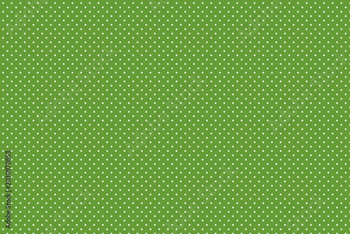 Green polka dot pattern on textured background  
