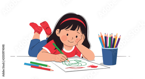 Creative young girl lies comfortably on the floor while focused on coloring a whimsical drawing with a variety of vibrant colored pencils.