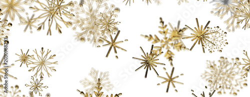 Obraz na plátně Elegant gold snowflakes scattered on a white background, creating a festive wint