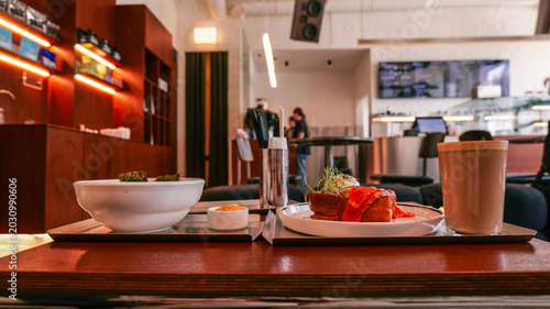 Photos Gourmet brunch spread with smoked salmon toast and coffee in a modern cafe